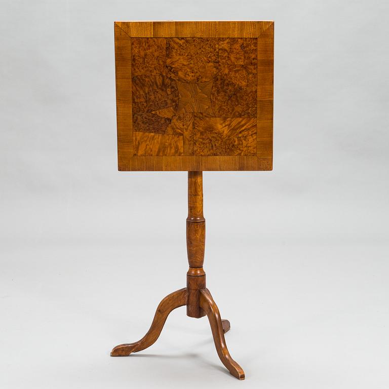 A tilt-top tripod table,  first half of the 19th century.