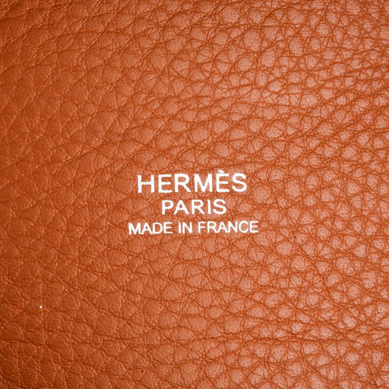 HERMÈS, a étoupe leather bag, "Picotin Lock".