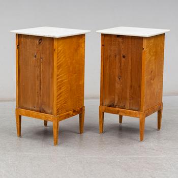 A pair of bedside tables from the first half of the 20th century.