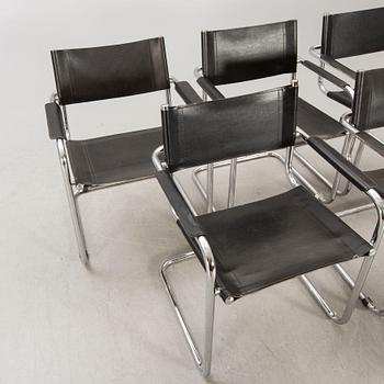 A set of five similar Italian 1970s chrome and leather armchairs.