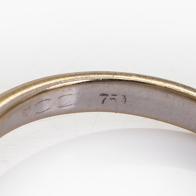 Sormus, markiisihiottuja ja prinsessihiottuja timantteja, 18K valkokultaa.