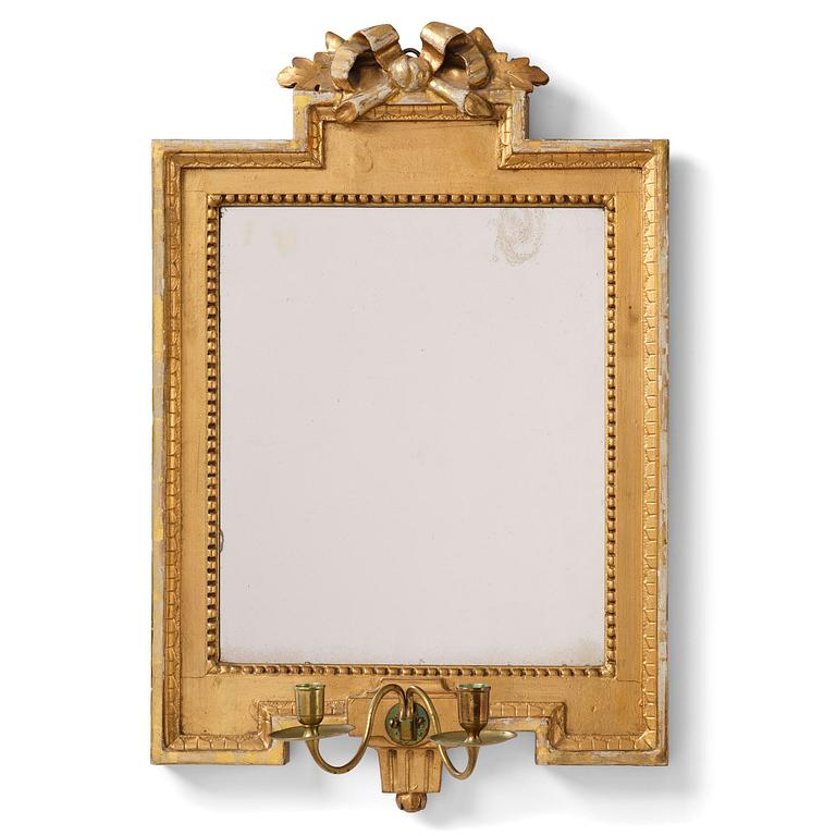 A Gustavian giltwood two-light girandole mirror by J. Åkerblad (master in Stockholm 1754-99).