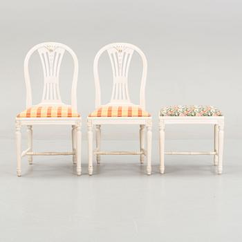 A dining table with eight chairs and a stool, Gustavian style, second half of the 20th Century.