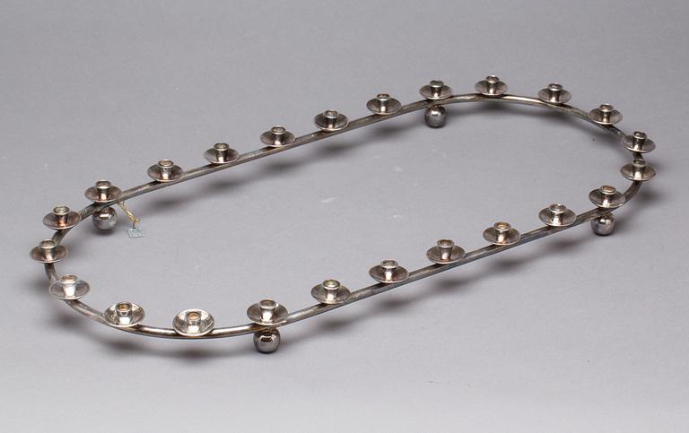 LJUSSTAKE, vitmetall, 1900-tal.