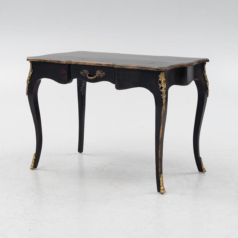 A rococo-style desk from the second half of the 20th century.