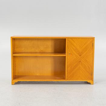 An earlier 20th century book case.