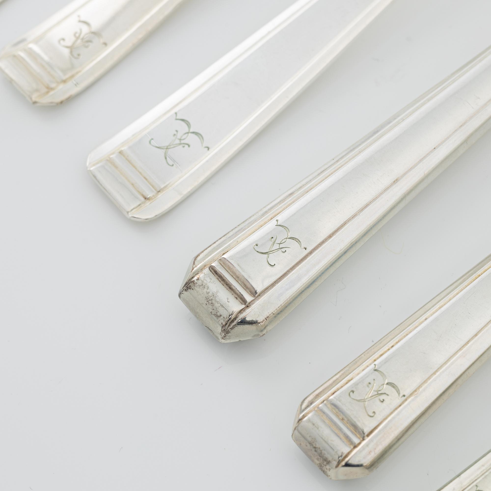 A 120- piece silver cutlery, bearing Swedish import marks, including CG. Hallberg, Stockholm, 1932.