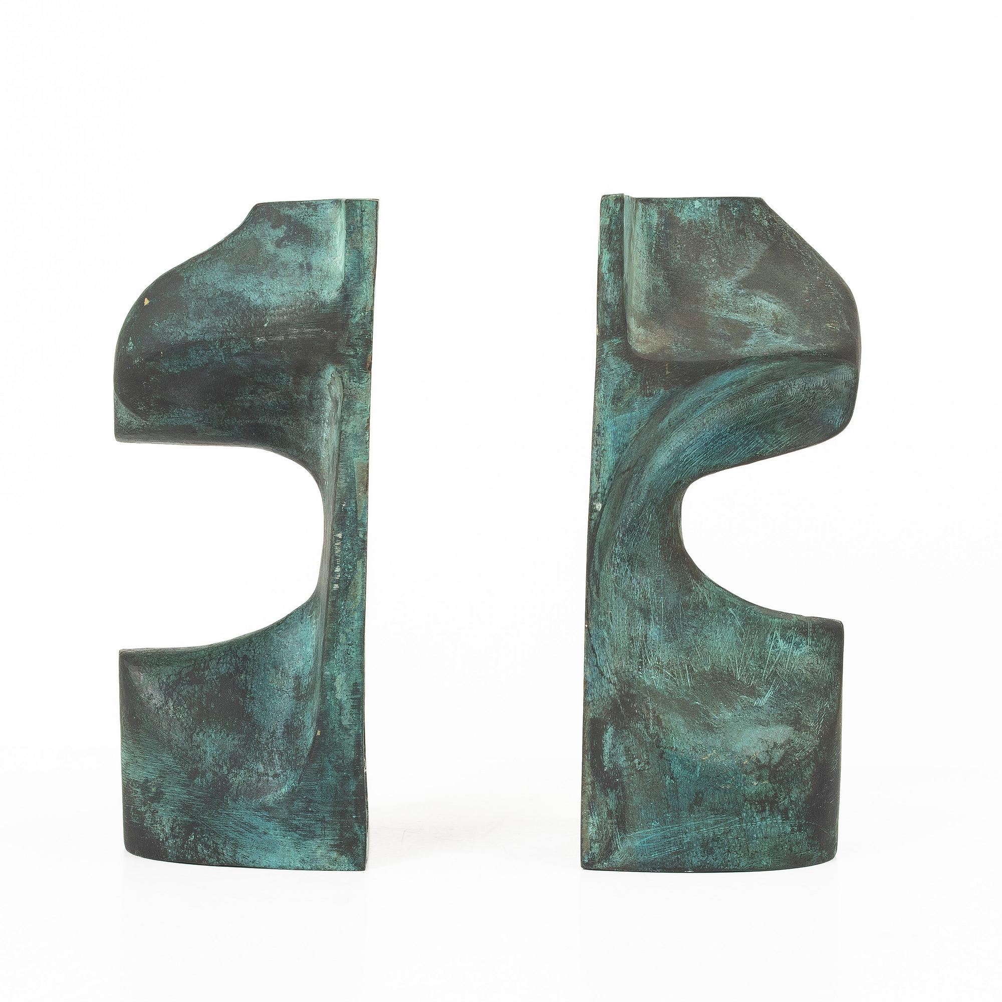 Björn Selder, a pair of green-patinated bronze sculptures/bookends, signed and numbered 4/100.