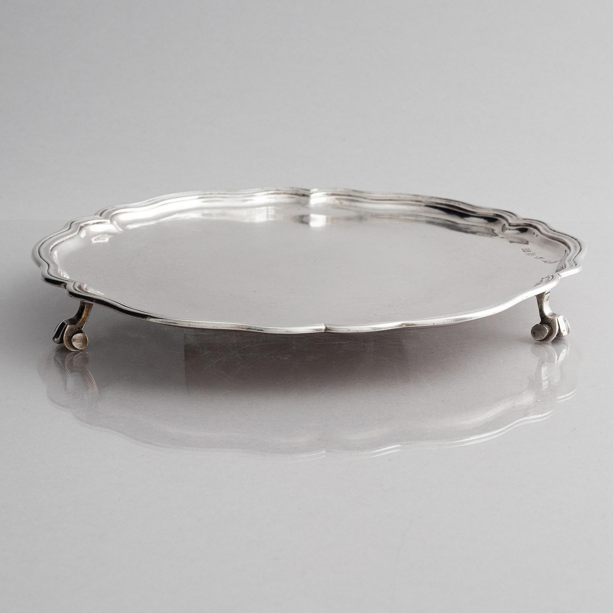A Russian silver salver/dish, unclear maker's mark, assay master Ivan Frolov, St. Petersburg, 1759.