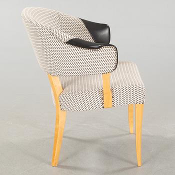 A 21st century"Lata greven" armchair by Carl Malmsten, O.H Sjögren.