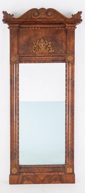A mirror and console table, first half of the 19th century.