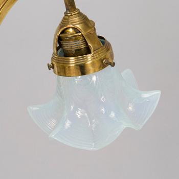 Kattovalaisin, 1900-luvun alku.