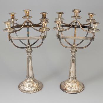 A pair of Art Nouveau candelabra, Silver plated.