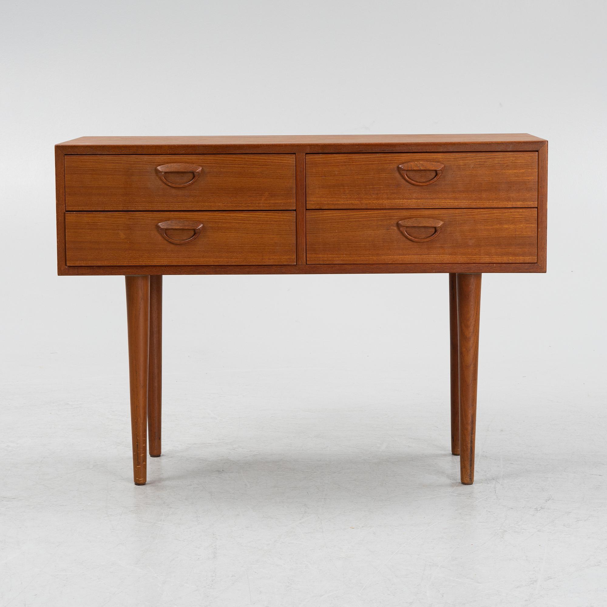 Kai Kristiansen, a teak veneered chest of drawers, Feldballes, Denmark, mid 20th century.