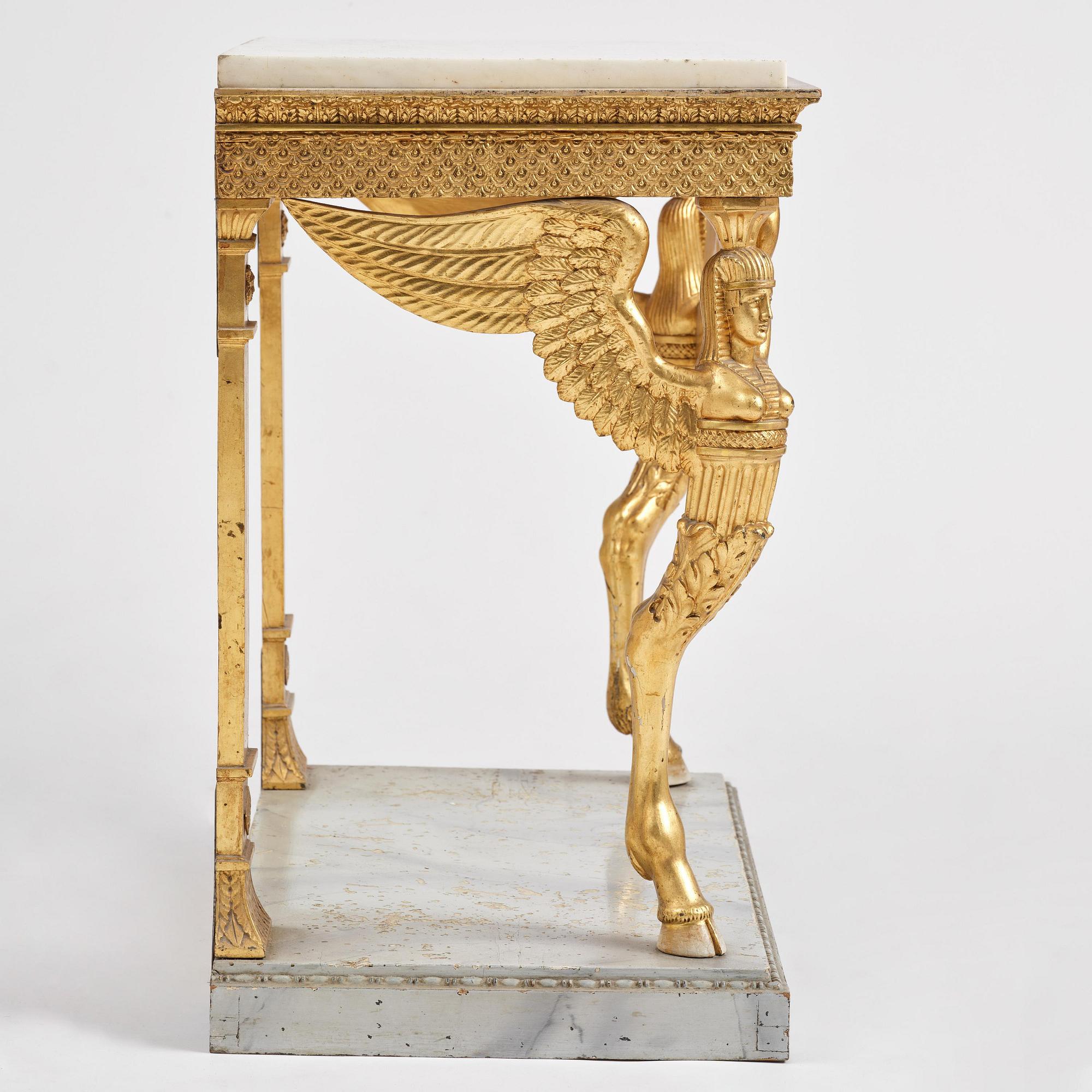 A late Gustavian giltwood console in the manner of J. Frisk, Stockholm, early 19th century.
