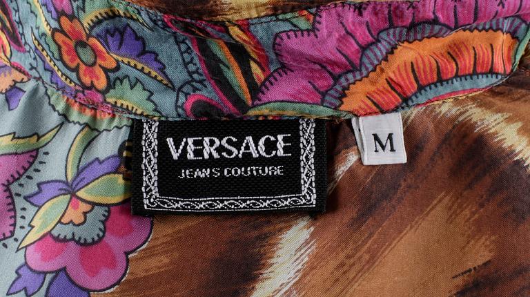 A silk blouse by Versace.