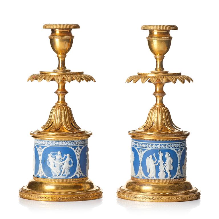 A pair of George III ormolu and jasperware candlesticks, late 18th century.