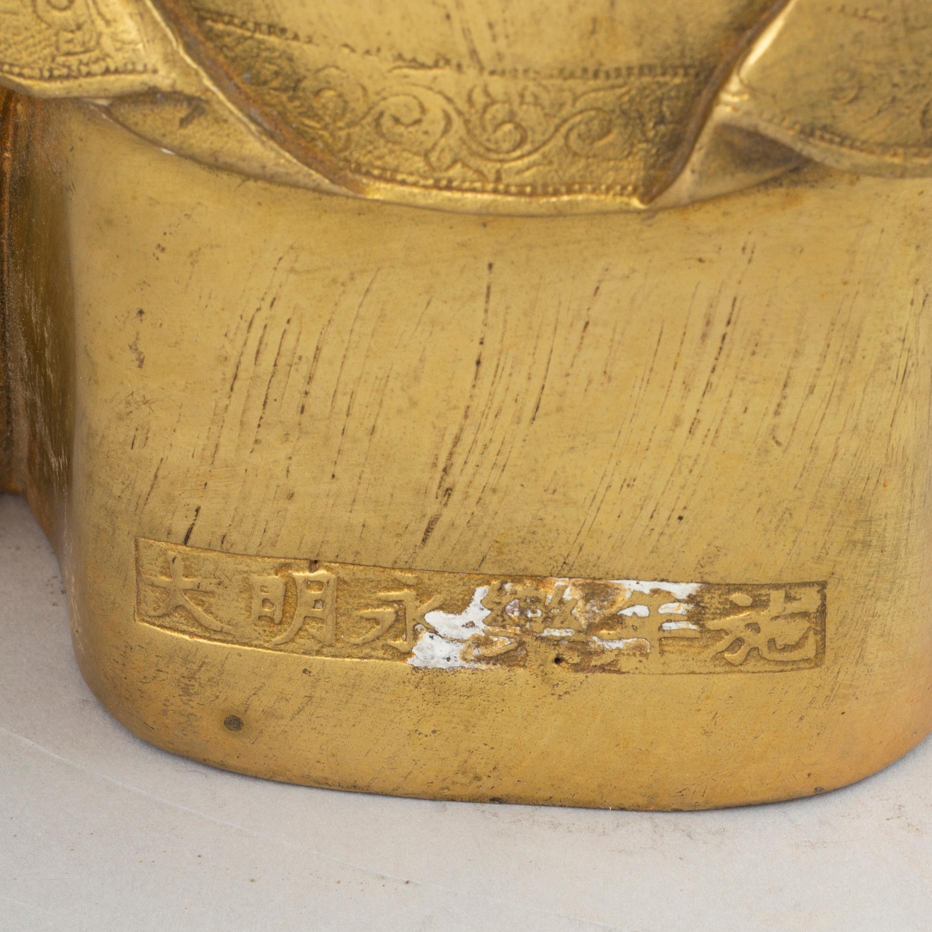 A bronze buddha, Ming style, 20th century.