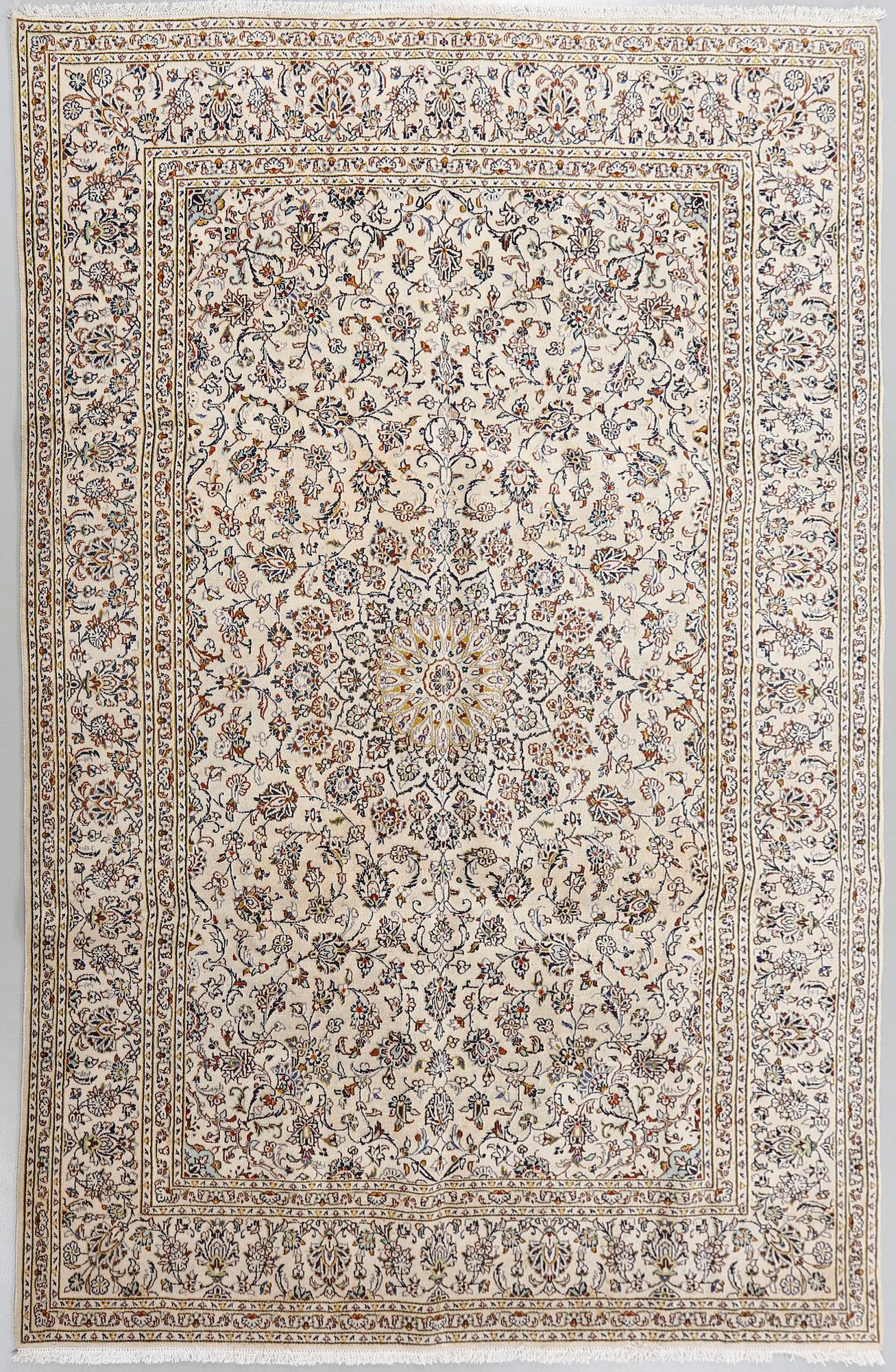 A Keshan rug, 340 x 236 cm.