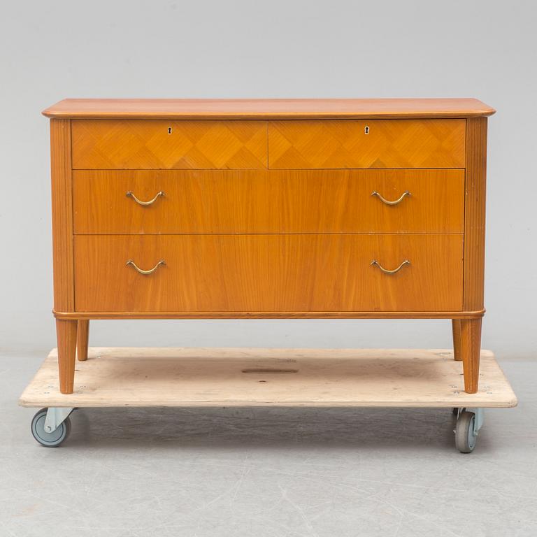 A 1940's elm Swedish Modern chest of drawers.