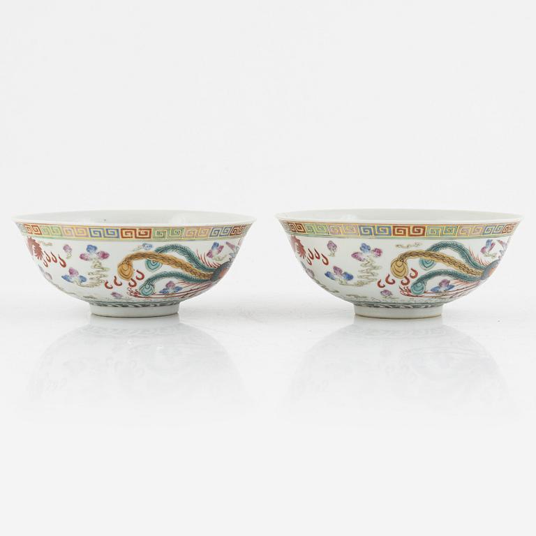 A pair of dragon and phoenix bowls, China, Republic with Qianlong mark.