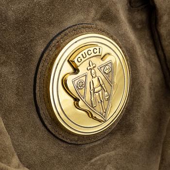Gucci, a suede bag.
