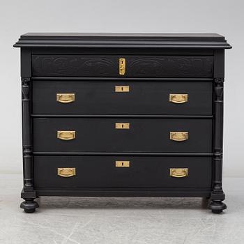 A painted chest of drawers from around year 1900.