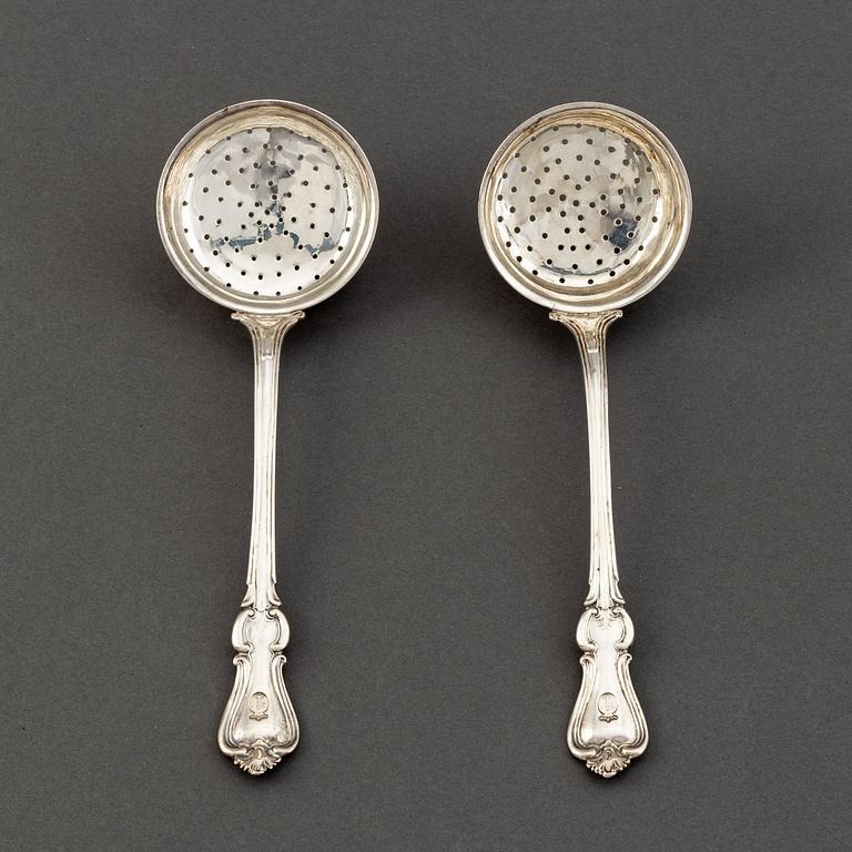 A pair of Swedish 19th century silver caster spoons, mark of Christian Hammer, Stockholm 1849.