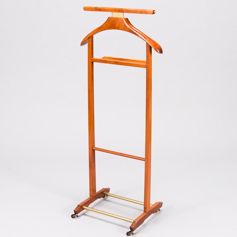 An Italian Fratelli Reguitti valet stand, the latter half of 20th century.