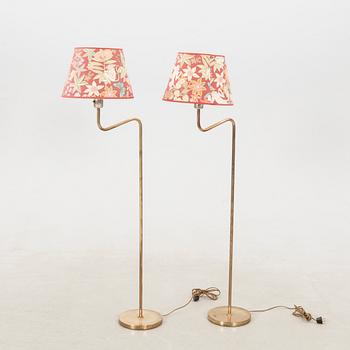 Floor lamps, a pair probably Aneta, late 1900s.