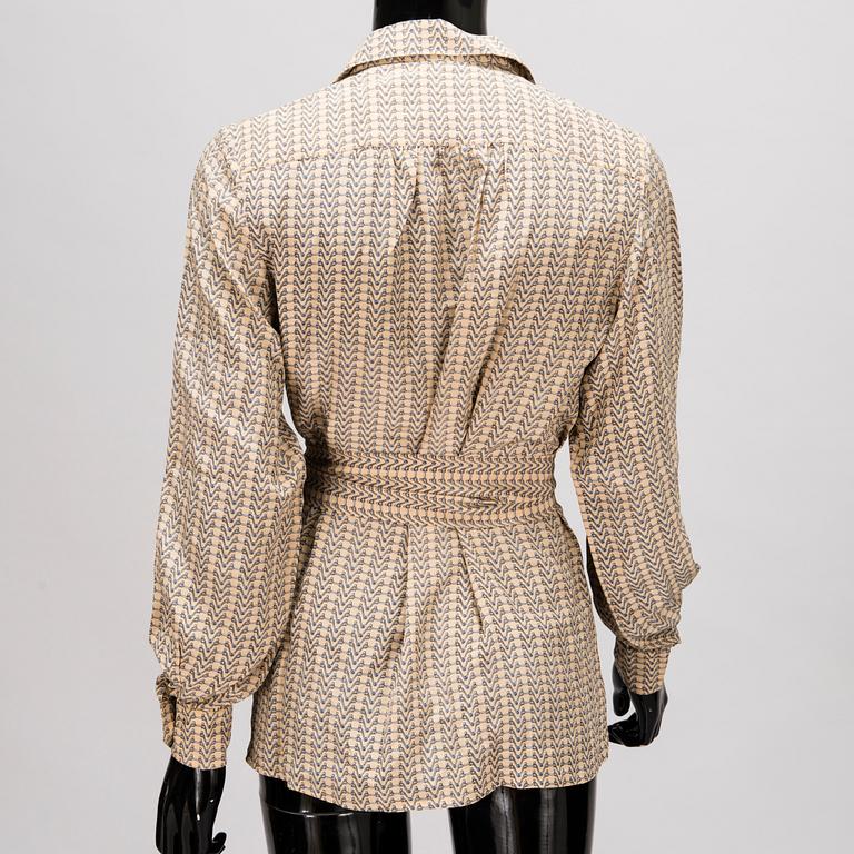 GUCCI Silk Blouse and a Leather Belt.