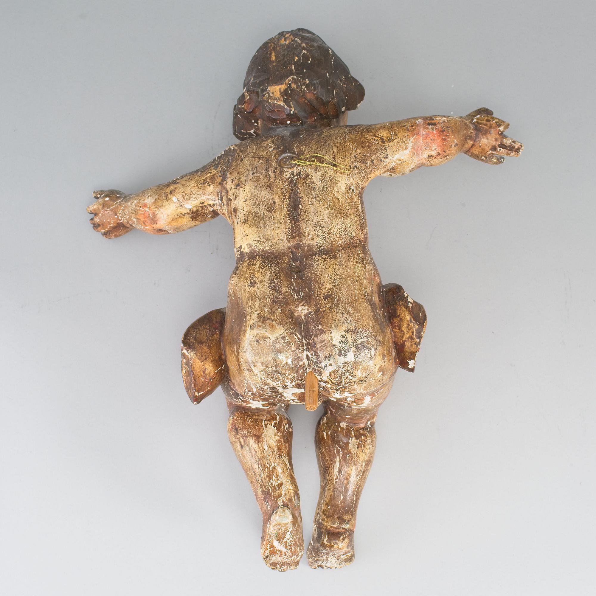A painted and parcel-gilt wooden sculpture, 18th/19th century.