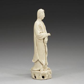 A blanc de chine figure of Guanyin with an attendant, Qing dynasty, 18th Century.