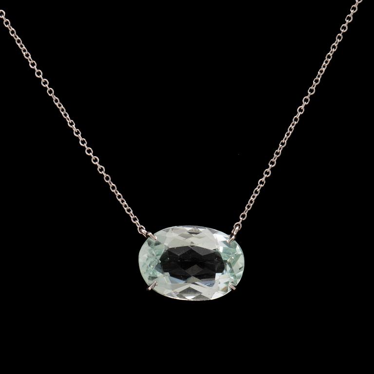 An 18K white gold necklace with an oval faceted aquamarine.