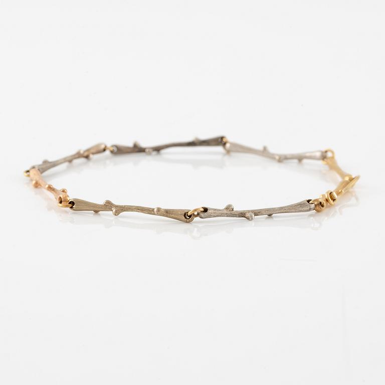 Ole Lynggaard armband 18K guld i tre färger, design Charlotte Lynggaard.
