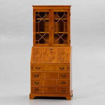 Slant-front secrétaire with glazed cabinet section, 20th century.