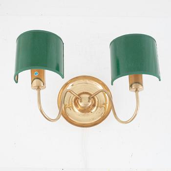 Josef Frank, a model 2565 brass wall lamp, Firma Svenskt Tenn.