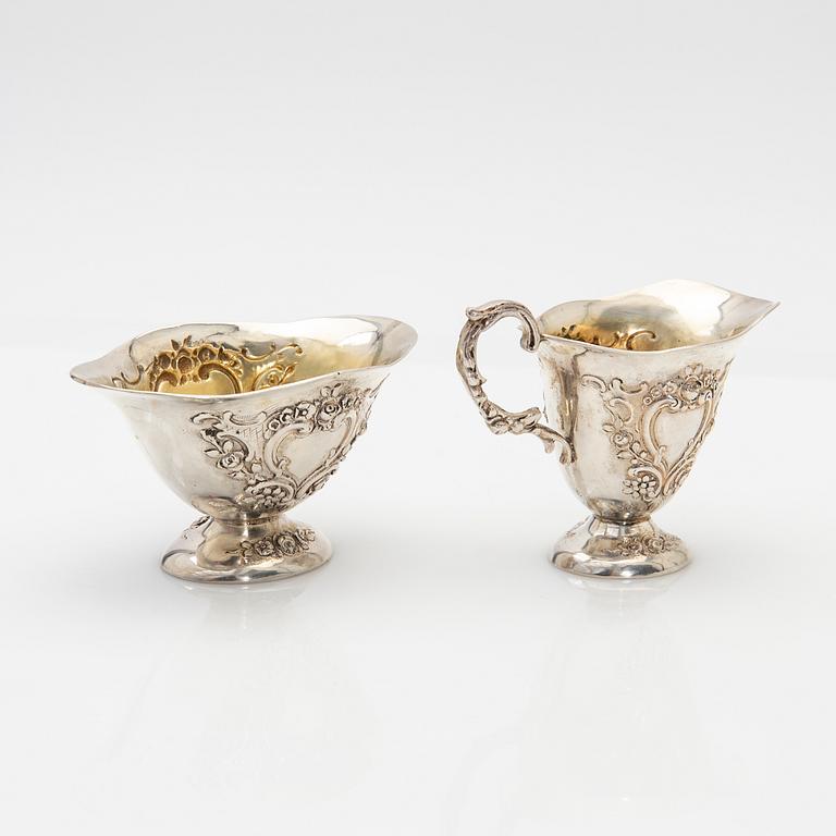 Cream jug and sugar bowl, silver, early 20th century.