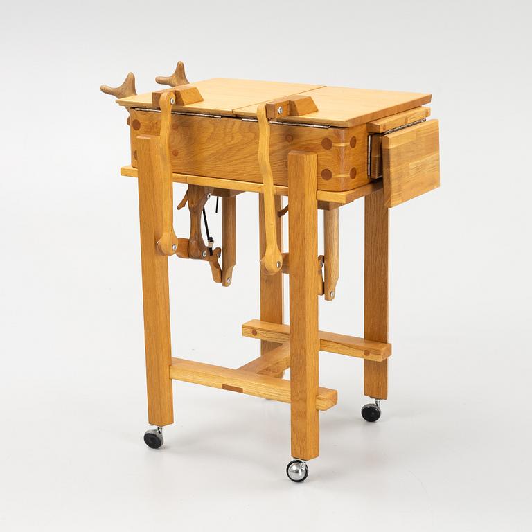 Magnus Ek, a oak wood praline trolley, Oaxen Krog, 2019.