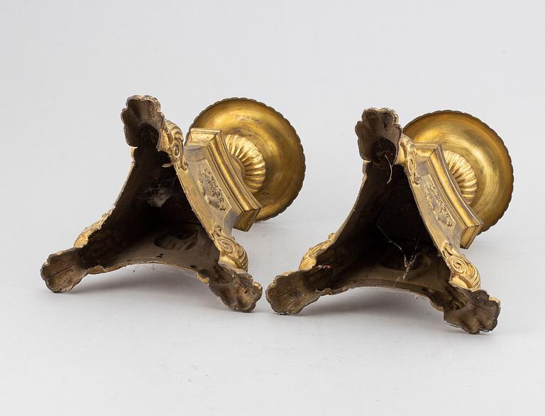 A pair of candlesticks from the 19th century.
