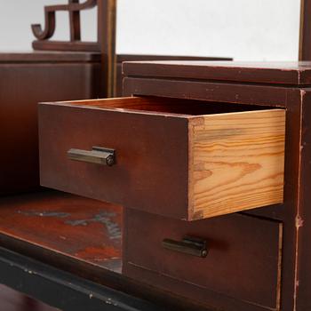 A Swedish grace mirror with a chest of drawers, 1920s/30s.