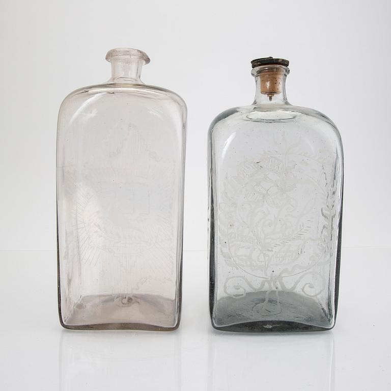 A set of four 19th/20th century glass decanters.