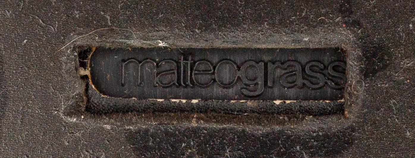 MATTEO GRASSI, a set of four leather chairs.