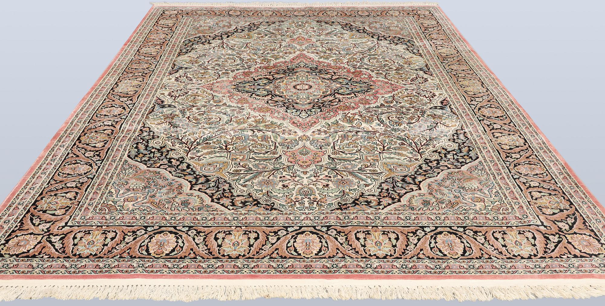 A silk carpet, Kashmir, c. 350 x 243 cm.