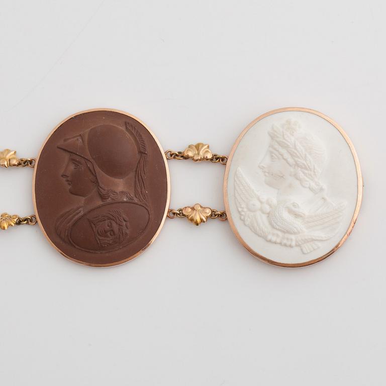 A lava cameo bracelet with antique motifs. One extra cameo included.