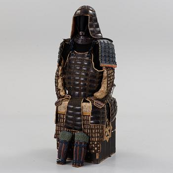 A Japanese suit of armor in the Tatami-Gusoho style, presumably mid Edo period.