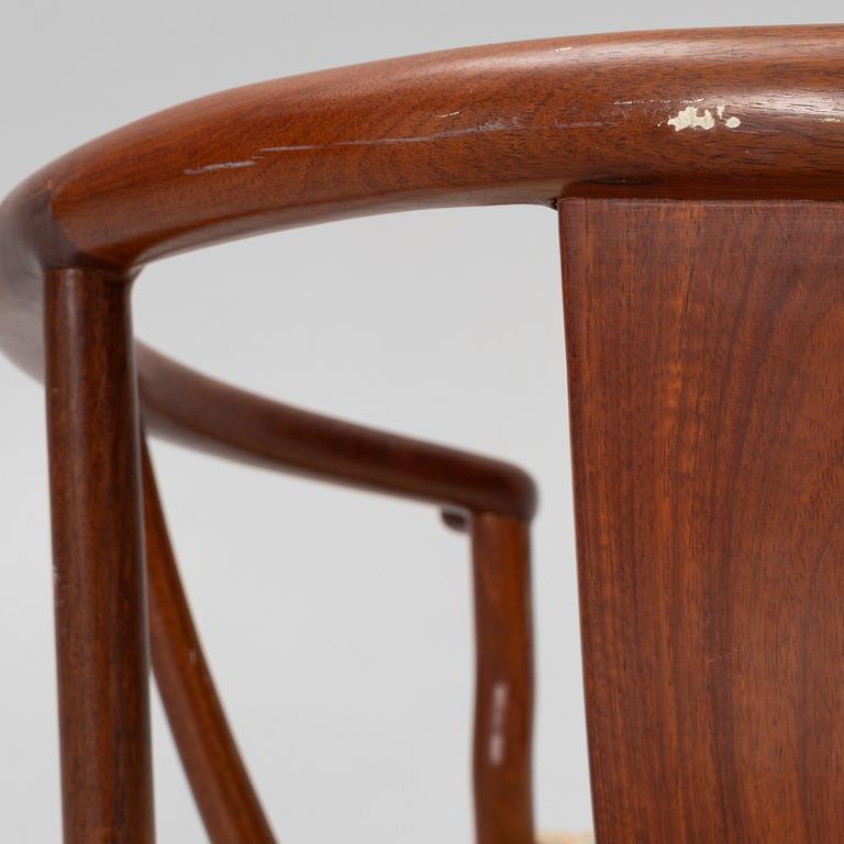 A pair of hardwood 'horse shoe back' hardwood armchairs, Hong Kong, 1960s.