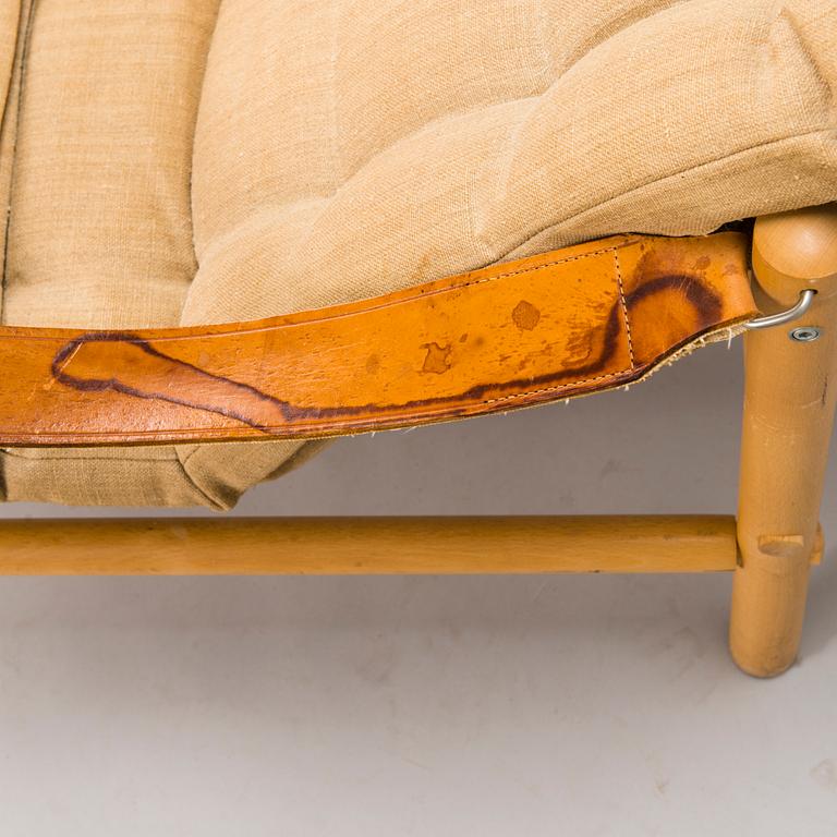 BROR BOIJE, A pair of 'Junker' easy chairs and an ottoman for Dux, Sweden, latter half of the 20th Century.