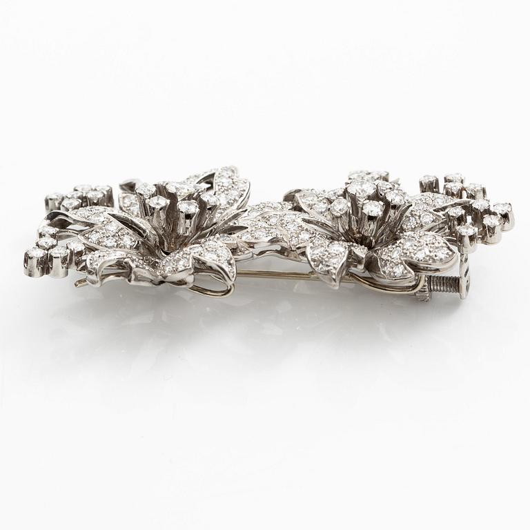 Brosch platina med runda briljant- och åttkantslipade diamanter.