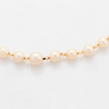 A cultured pearl necklace with a WA Bolin clasp.